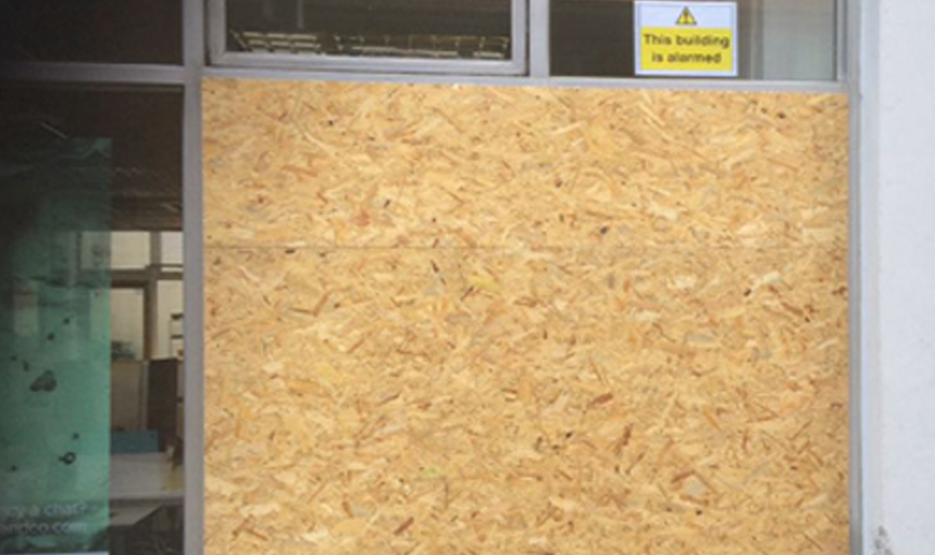 First london glass Boarded up window